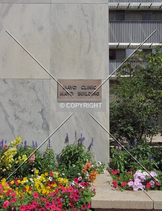 Plaque and flowers along 2nd Street SW