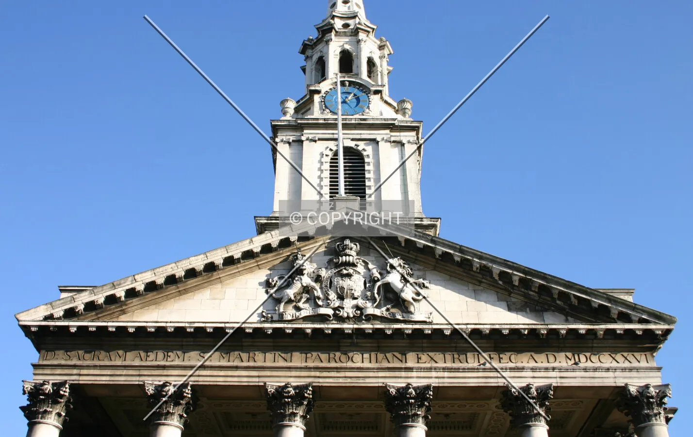 The pediment supported by columns with Corinthian capitals