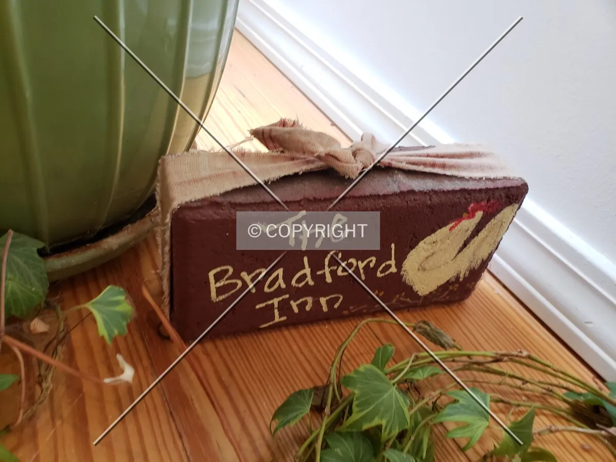 A decorative brick in the lobby; October 18, 2018