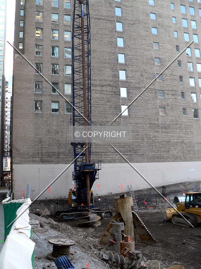 View along the southern perimeter toward a caisson drilling crane