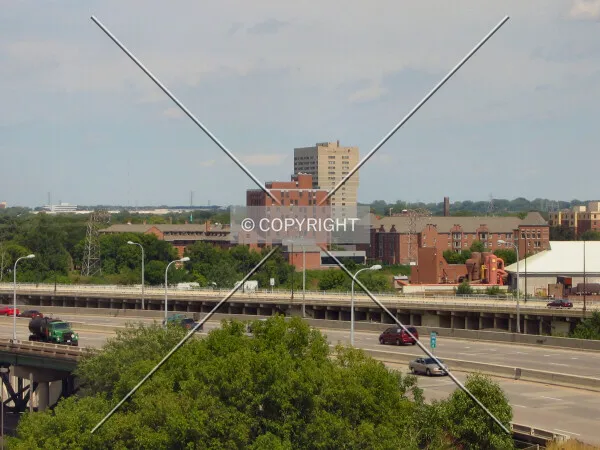 Distant elevated view from the southwest, over the old Interstate 35W Bridge