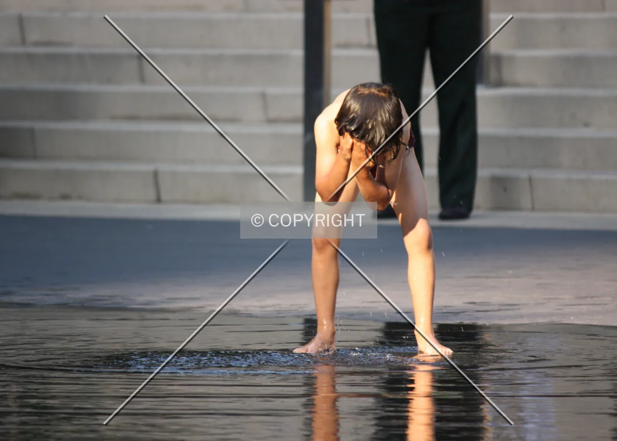 Boy playing in water