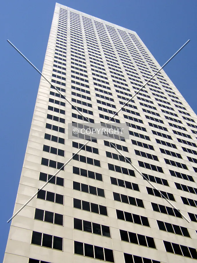 Looking up the eastern facade from McKinney Street below