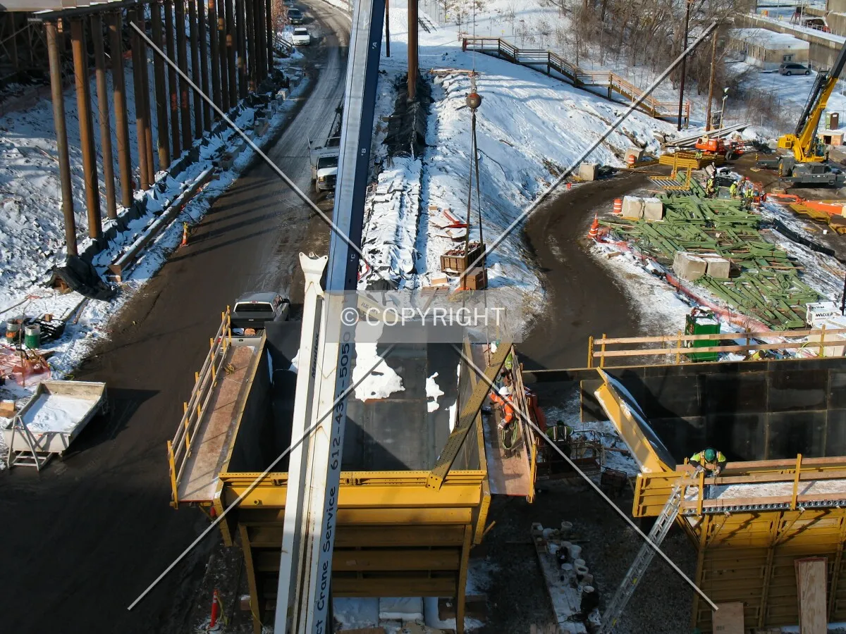 Lifting materials next to West River Parkway