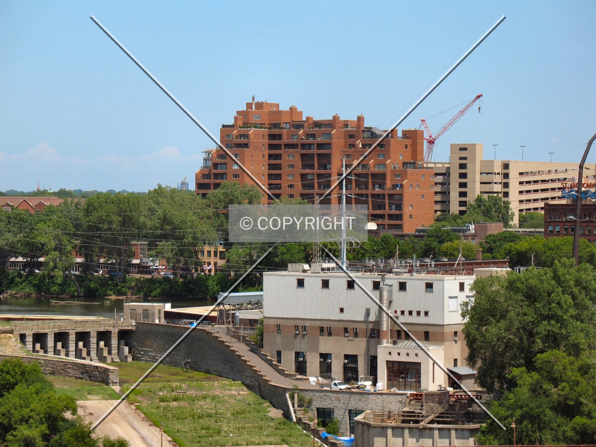View across the Mississippi River and St. Anthony Locks from the terrace on the Endless Bridge at the Guthrie Theater