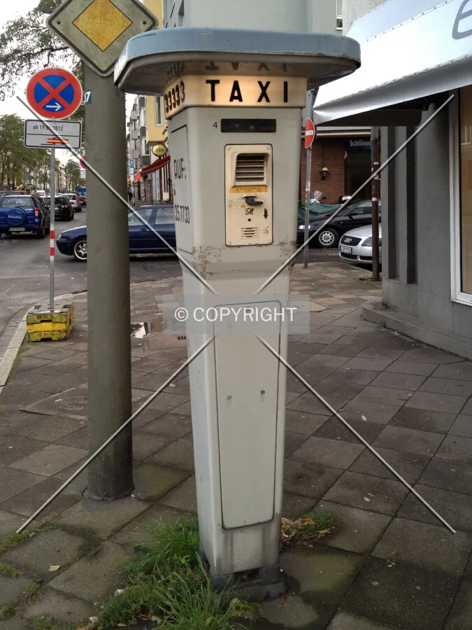A pillar containing a taxi calling service