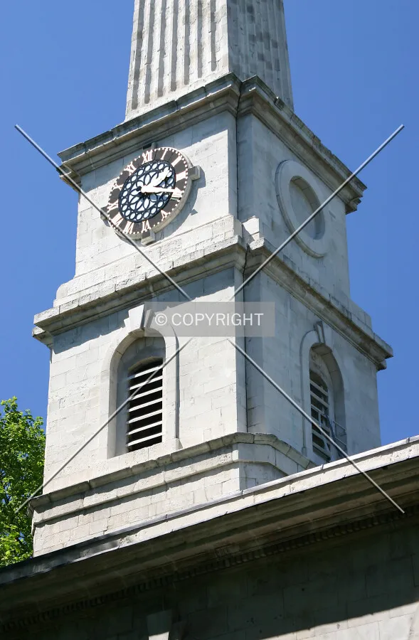 The clock tower and base of the obelisk spire