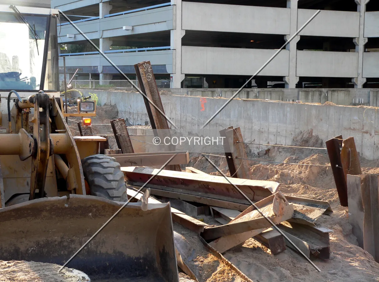Steel beams scattered around the site