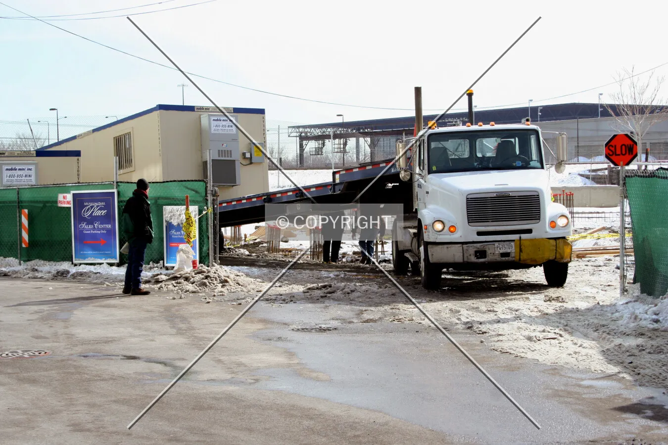 Unloading a mobile trailer at the northeast corner