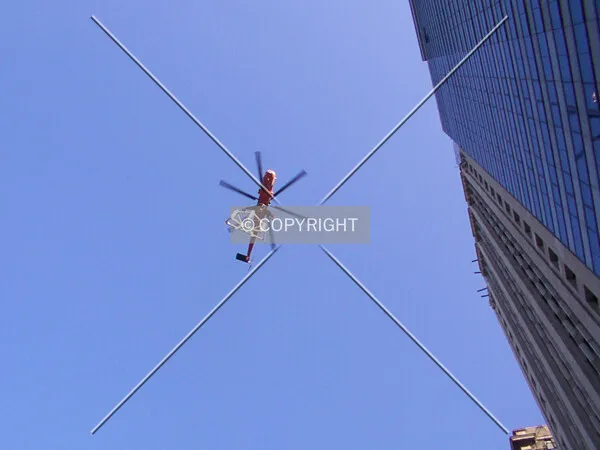 In front of Mather tower, under the helicopter