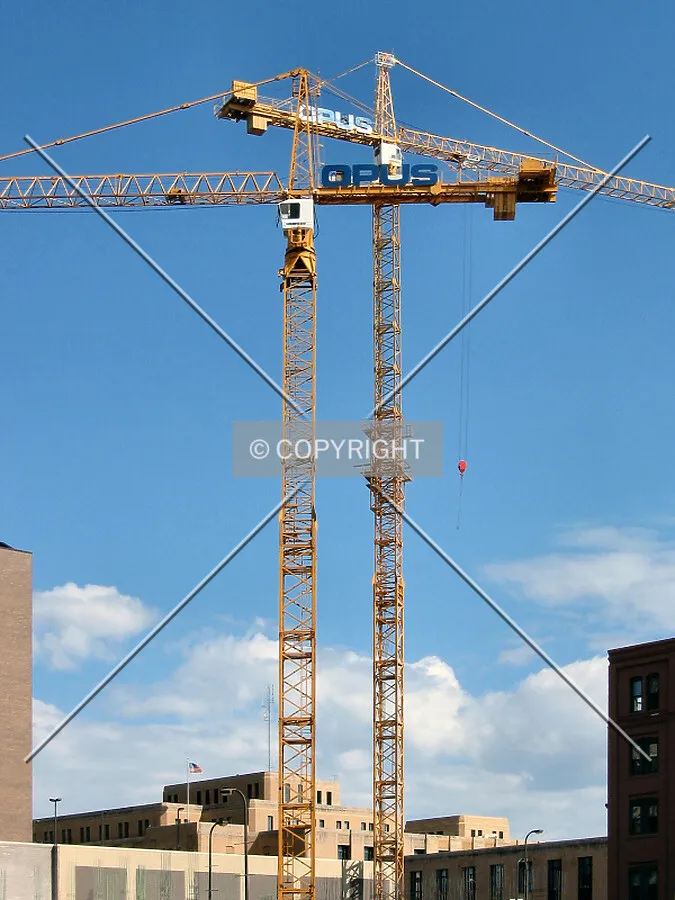 Both tower cranes from 2nd Street South