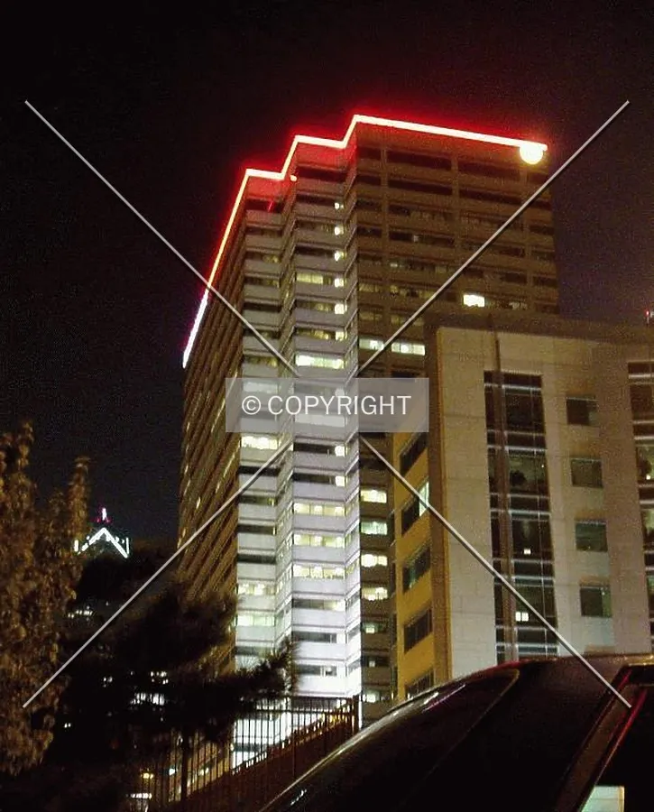 From the north on Vine Street at night, with Two Liberty Place in the background