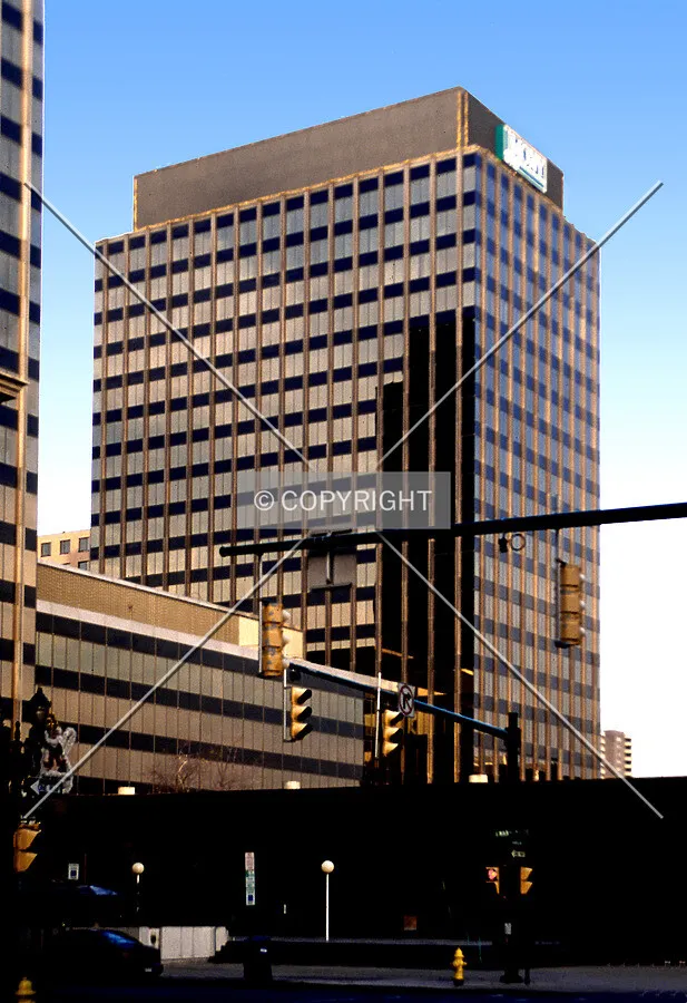 View from the southwest with the previous sign at the top of the building