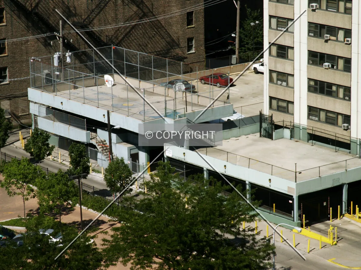 Basketball court and garage platform on the west side