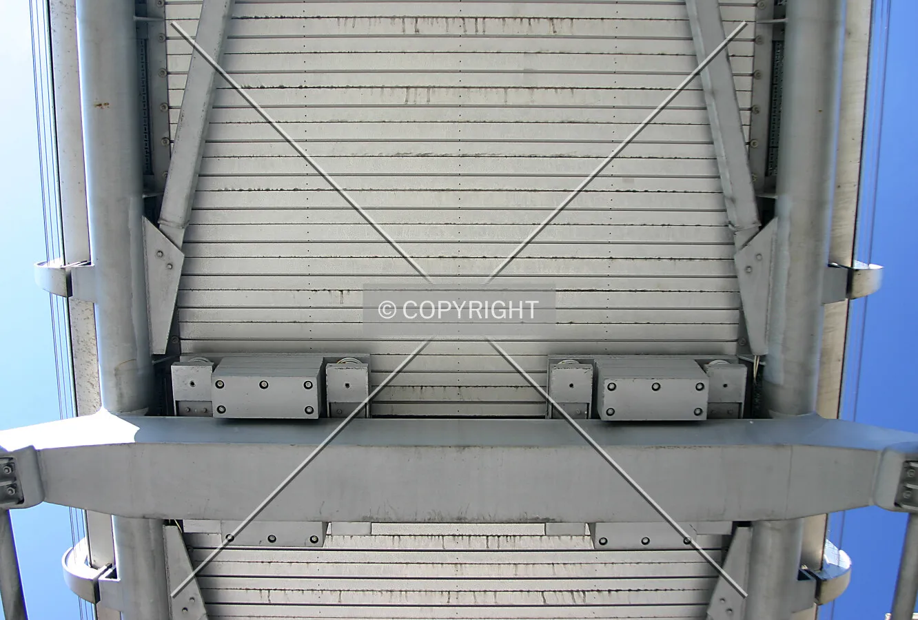 Looking straight up at the underside of the deck and dampening system on the north side