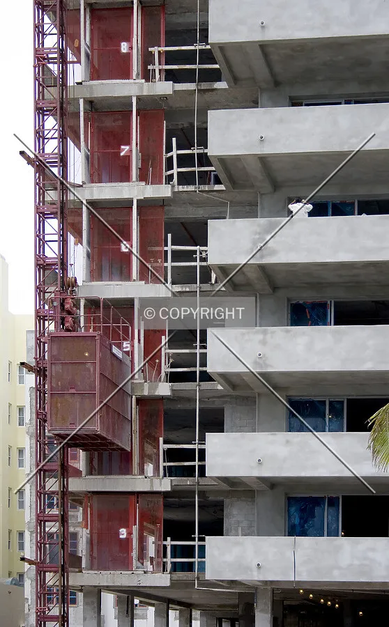 Construction elevator and lower floors, southeast corner