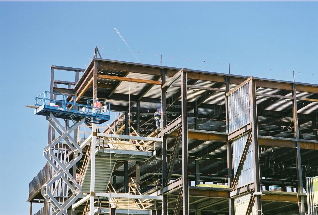 Ironworkers welding and grinding