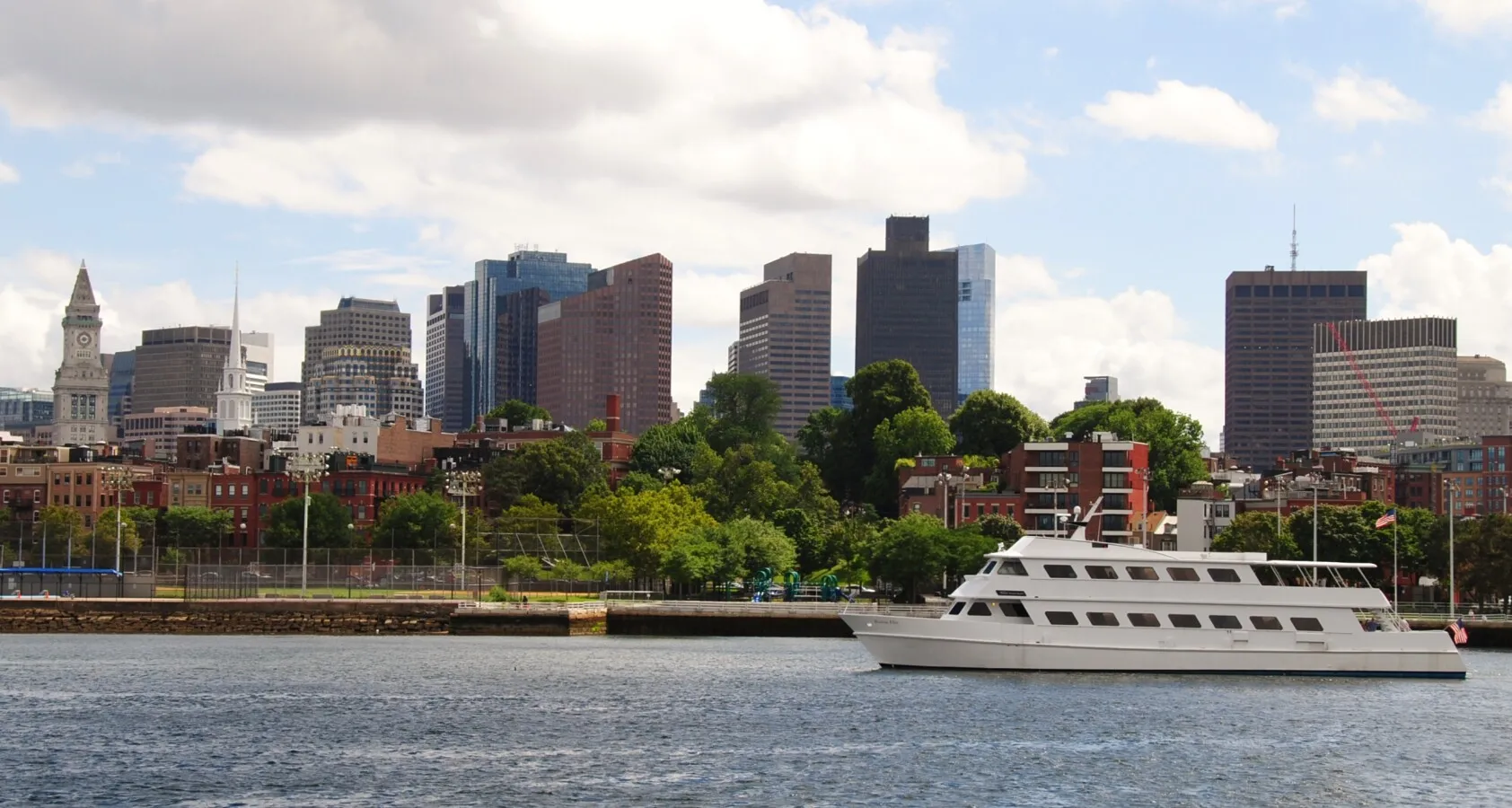 Passing boat and part of downtown Boston skyline
