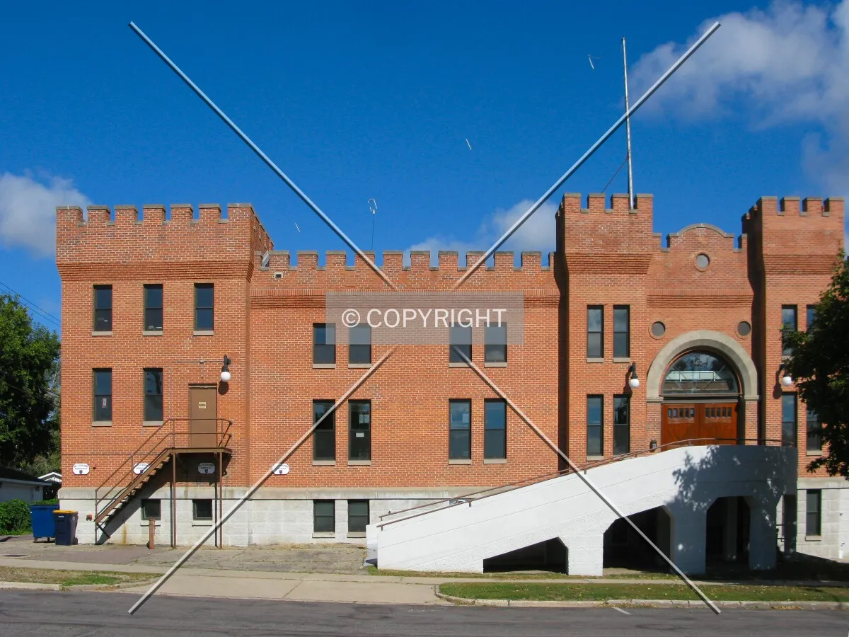 View to the northwest across 2nd Street North, with the ramp to the 2nd level