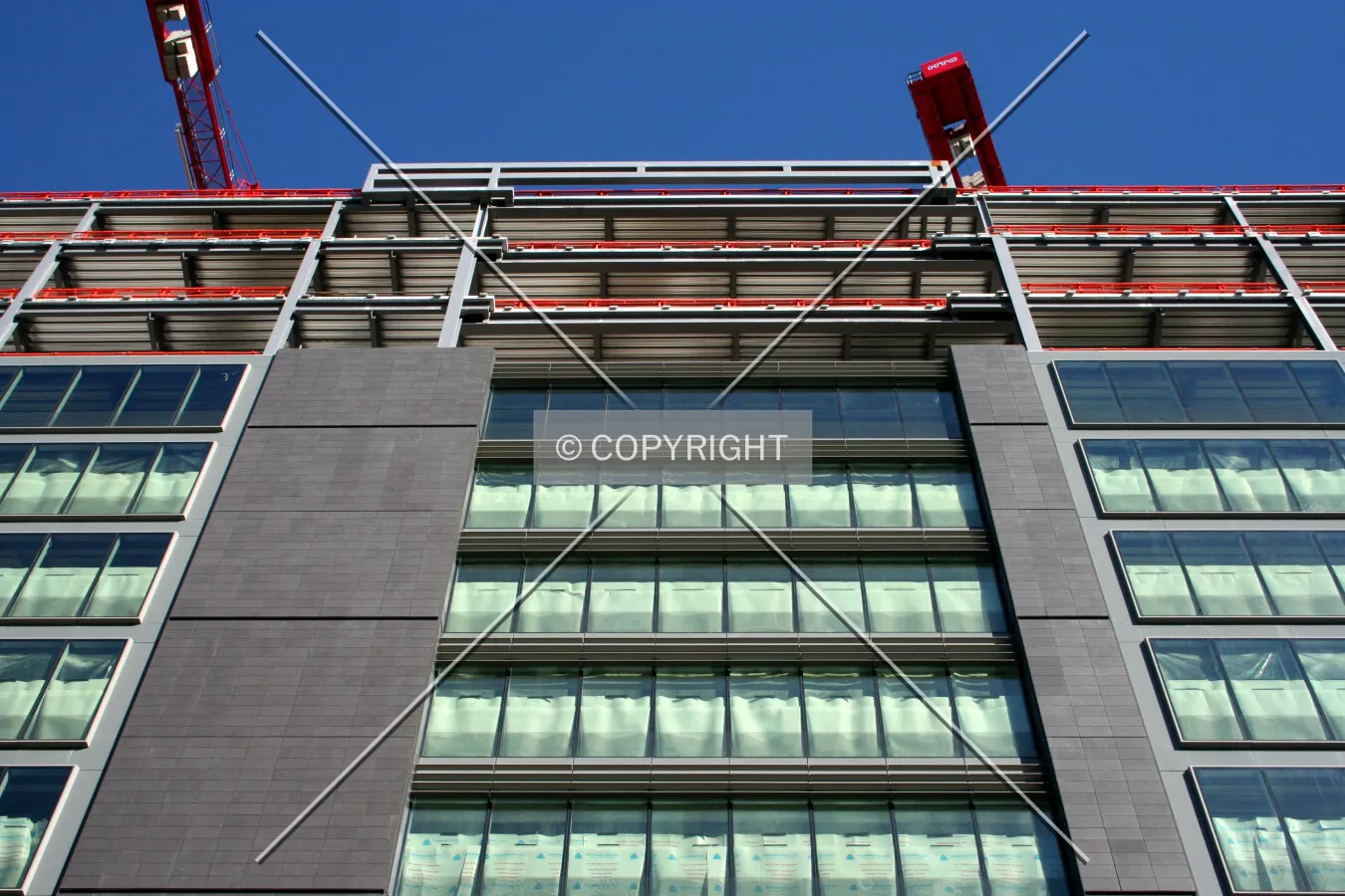 Looking up at the facade progress