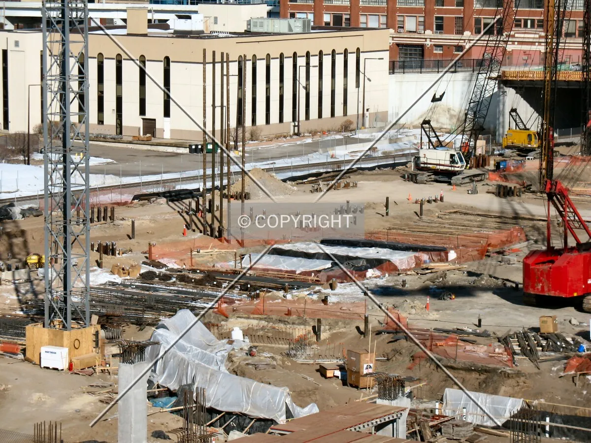 Piles of varying heights along the future left field line