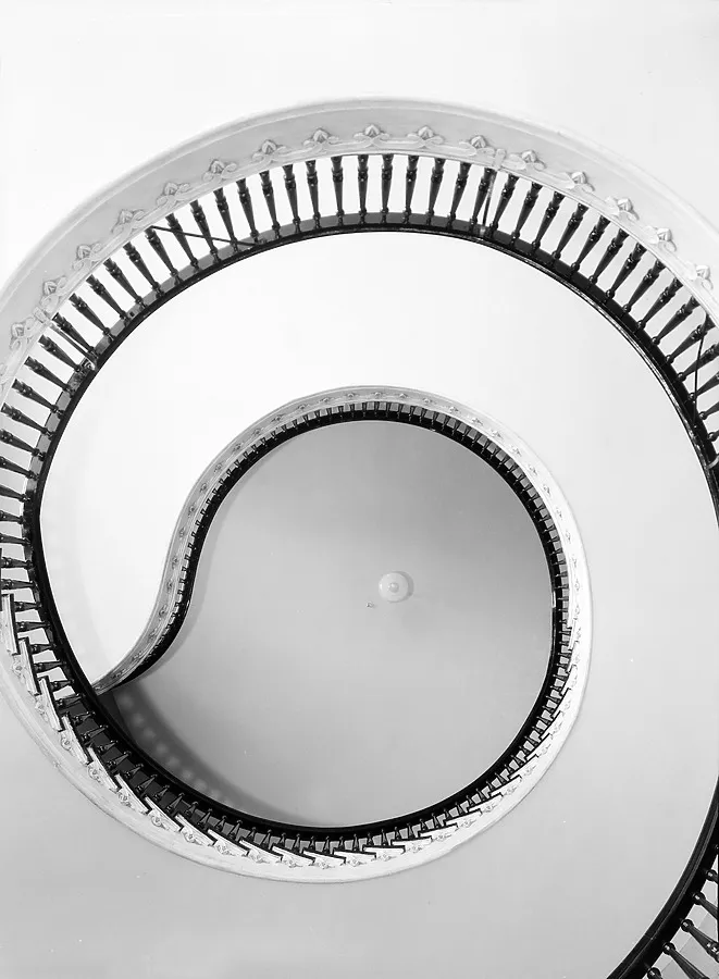 Vintage view of a spiral staircase well