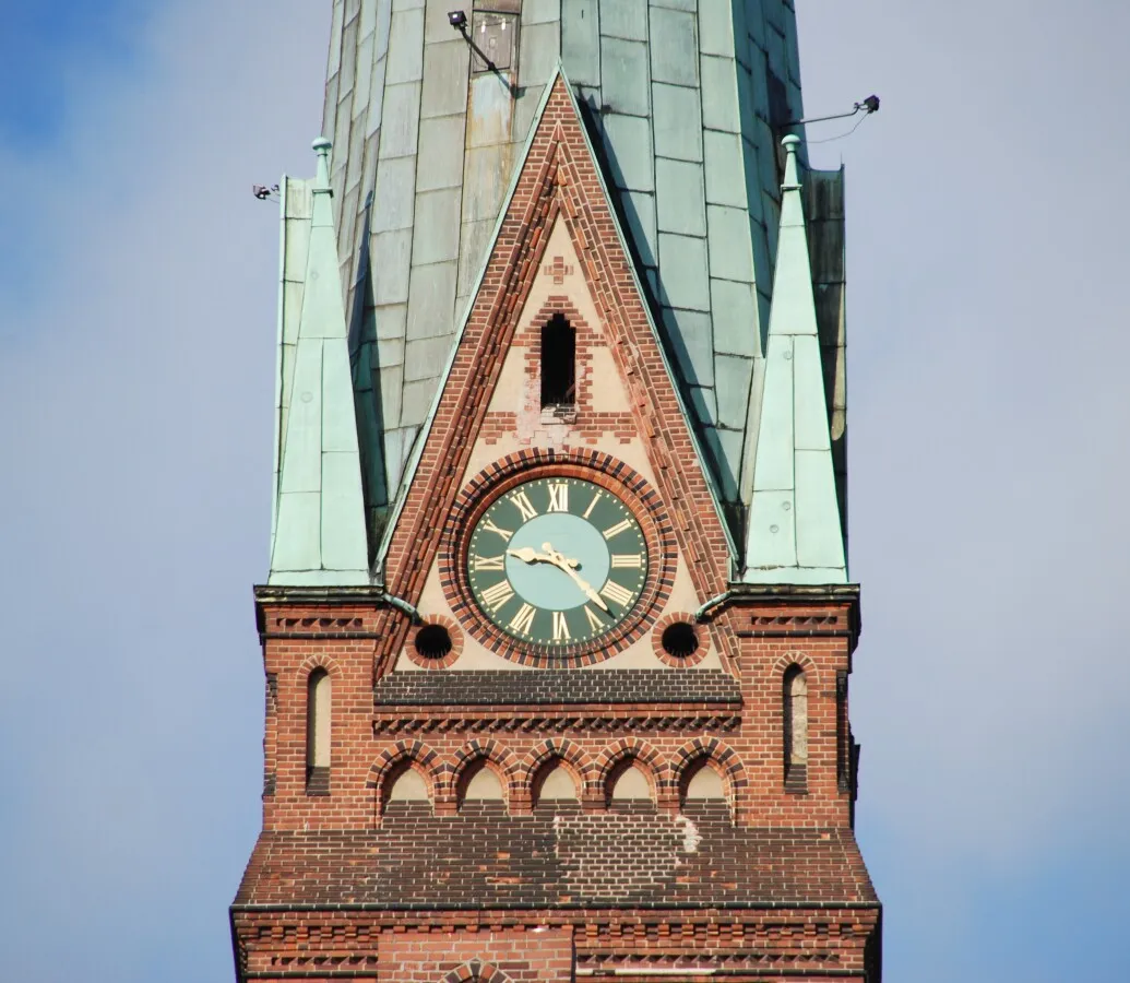Clock on the spire facade