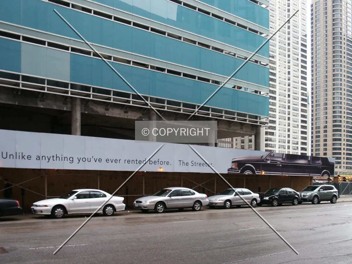 Slogan and limousine over the walkway on Grand Avenue