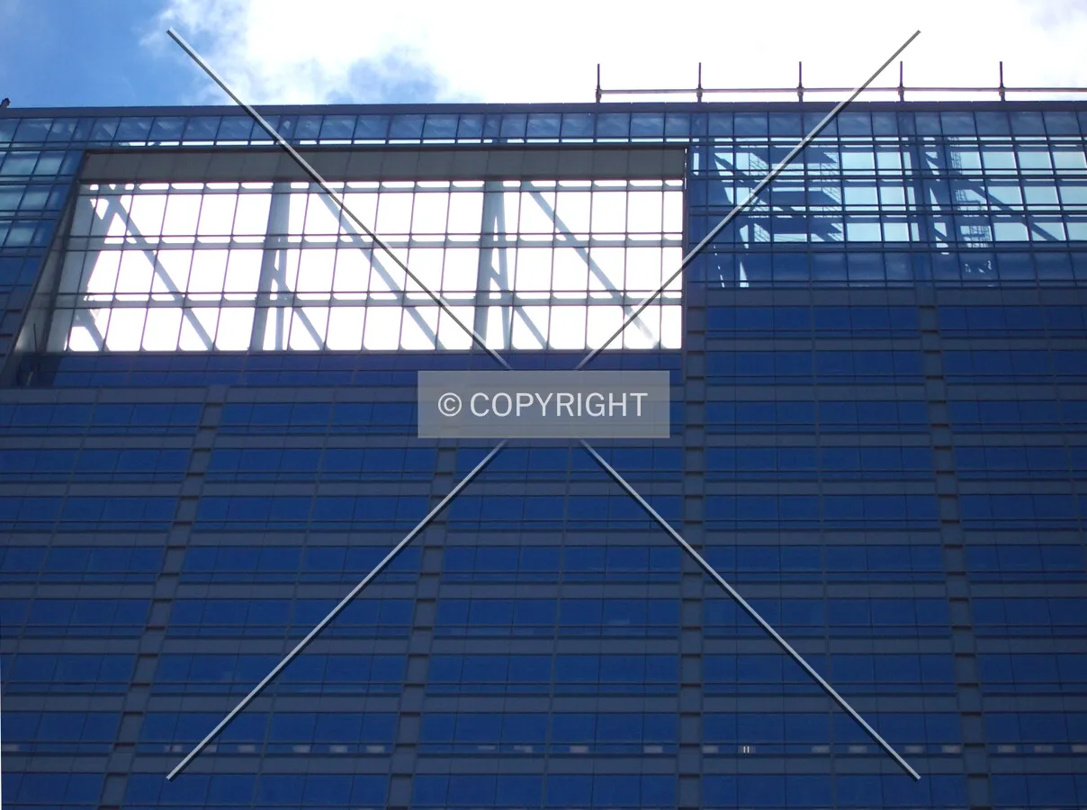 Top of the east facade, with the screen illuminated by sunlight