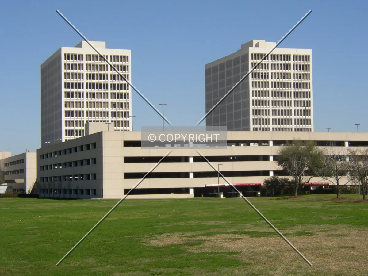 Looking north from Dallas Street towards the Riviana Building on the right and the Liberty Tower on the left