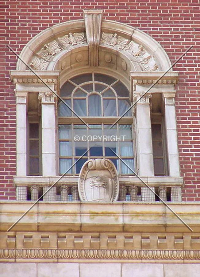Top floor window and decorative work