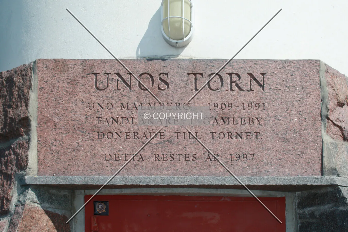 Unos Torn - Sign over the lighthouse entrance