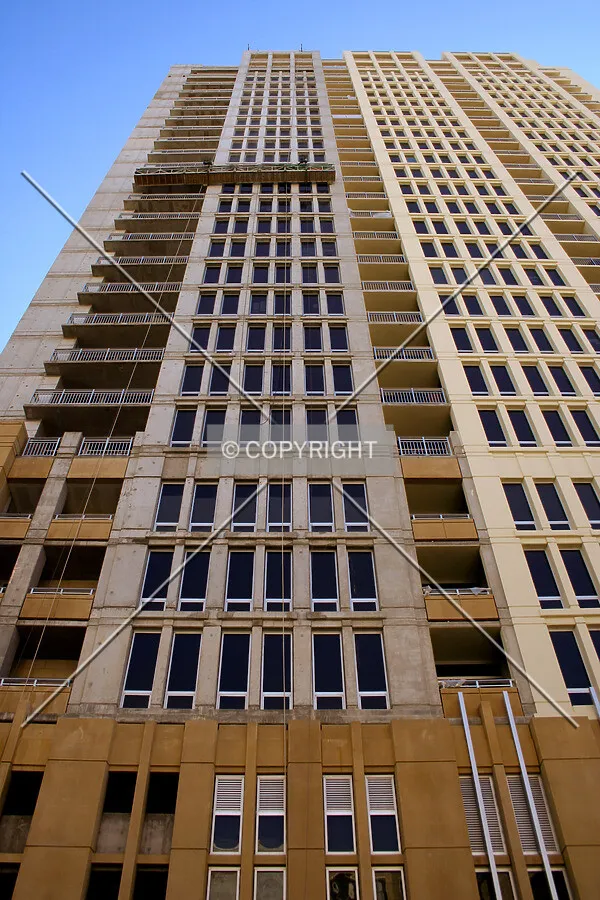 Unpainted strip on the north facade