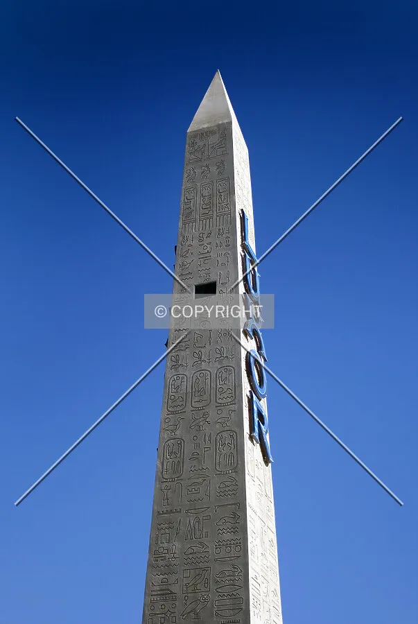 Obelisk-shaped hotel sign, east side