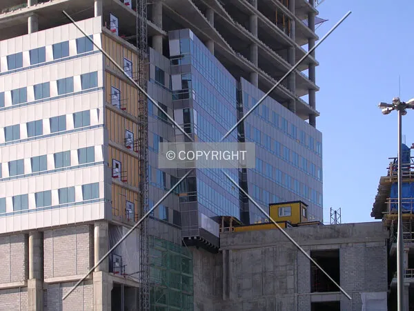 The already installed facade from the northeast