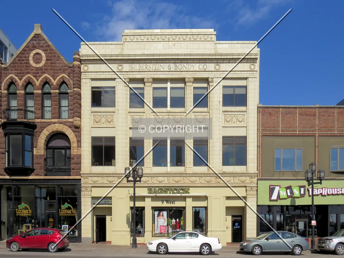 Full front elevation from across Superior Street