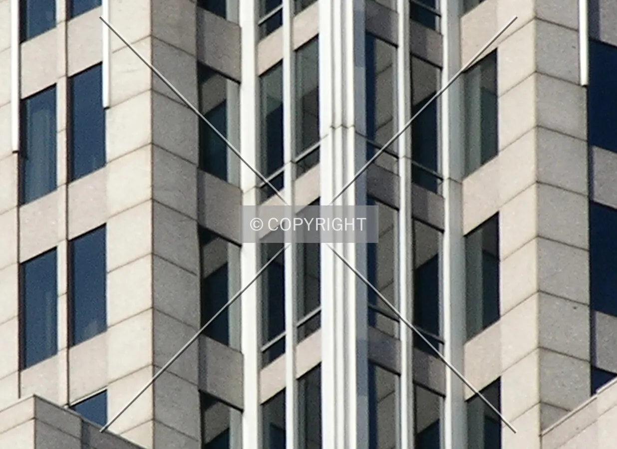 Detail of the facade on the upper floors of the southeastern corner
