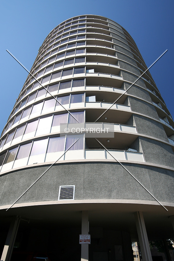 Looking up the circular facade from the northeast