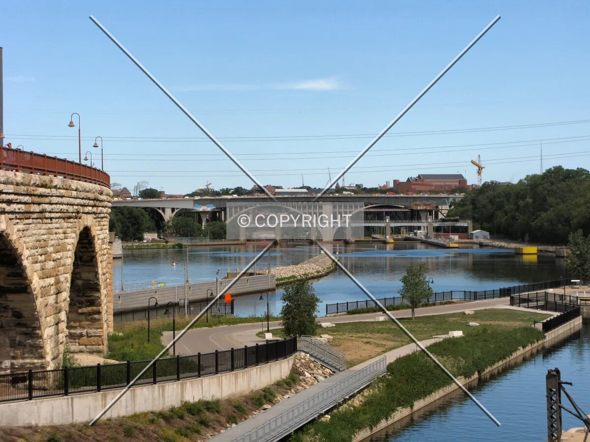 View down the Mississippi River from Mill Ruins Park; Stone Arch Bridge on the left