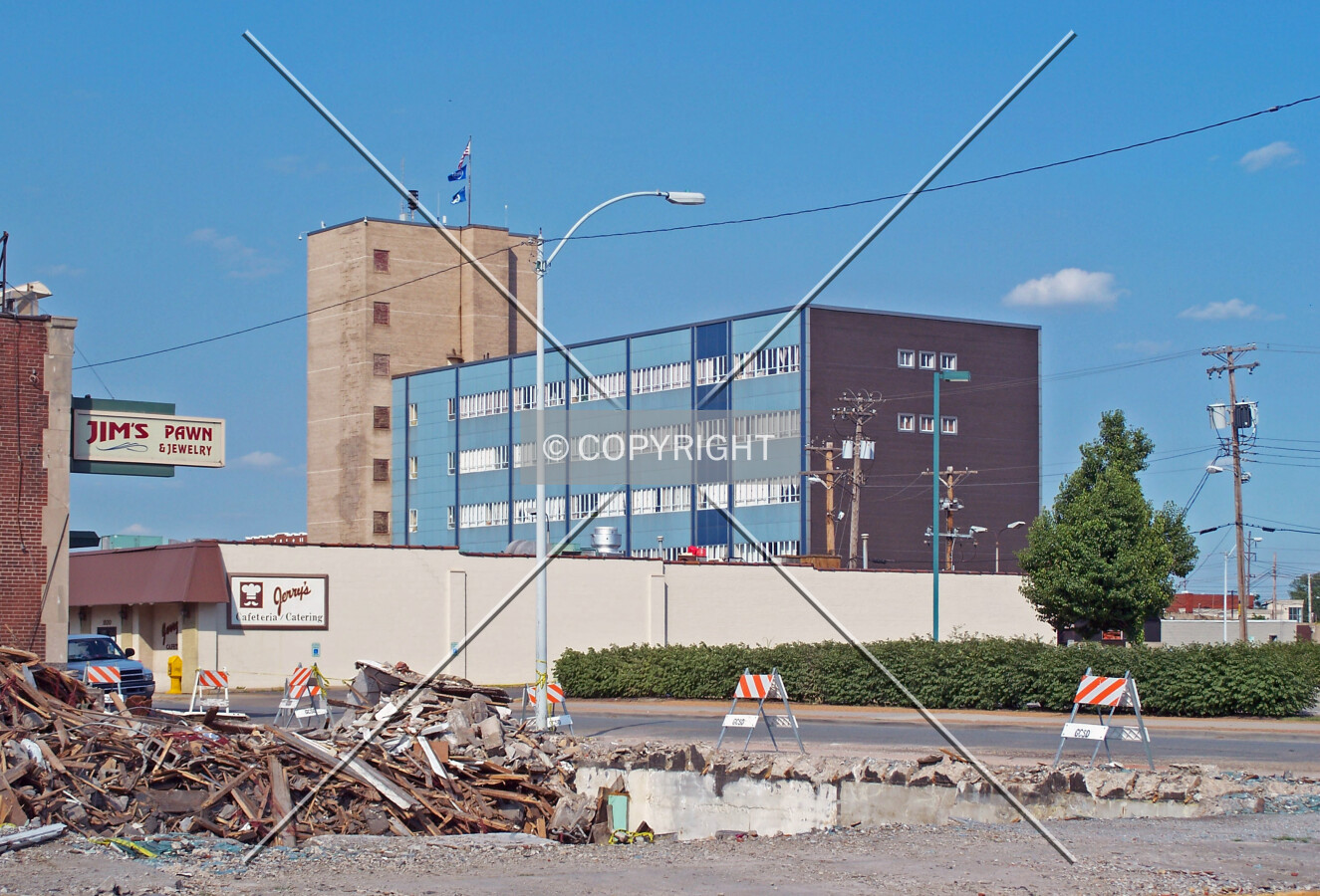 View from the west across demolition work on the D'Ryan's Department Store; July 1, 2008