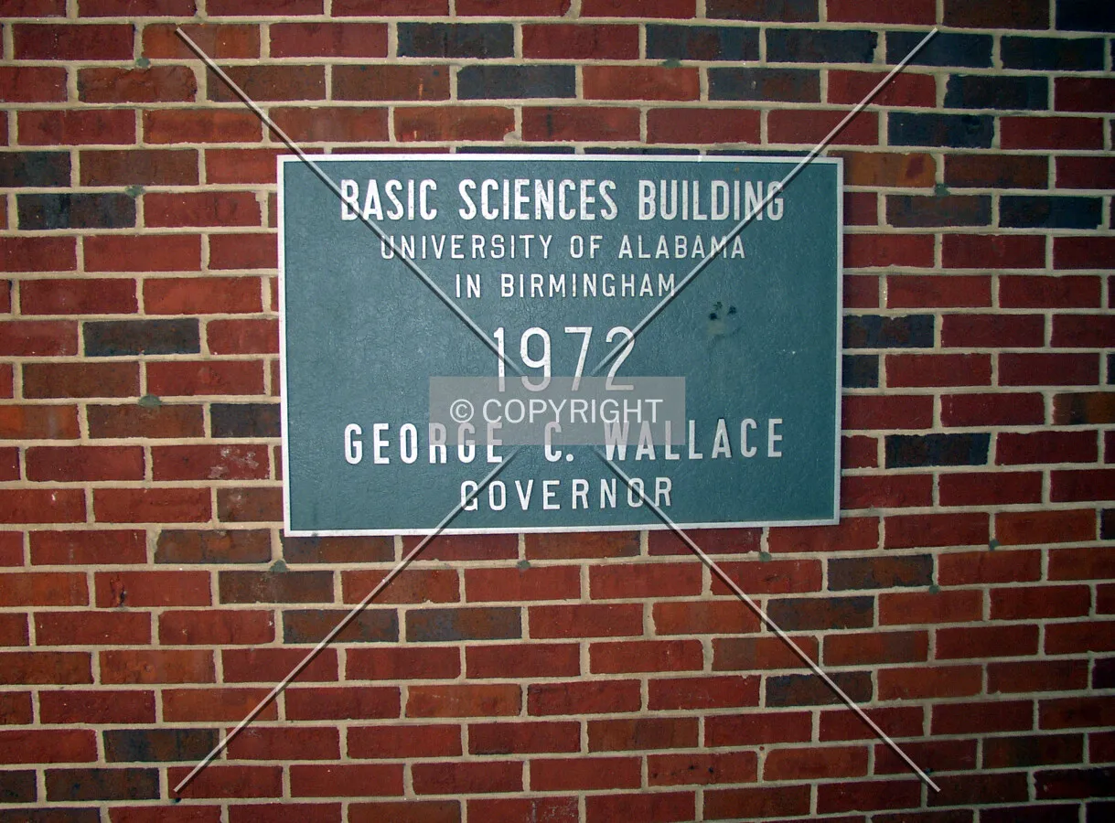 Dedication plaque adjacent to the main entrance