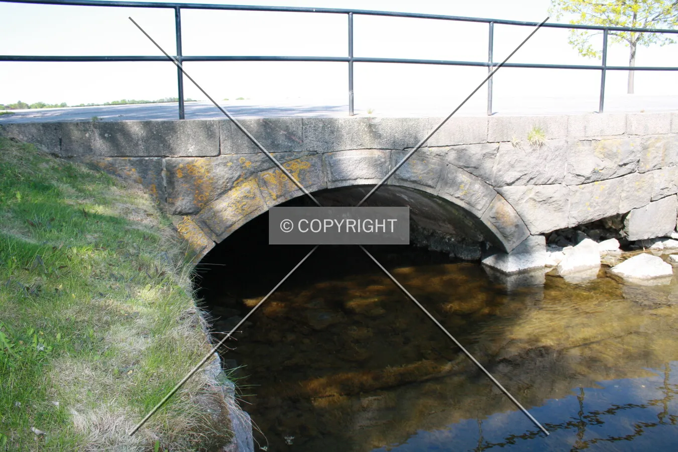 A small bridge spanning over a creek