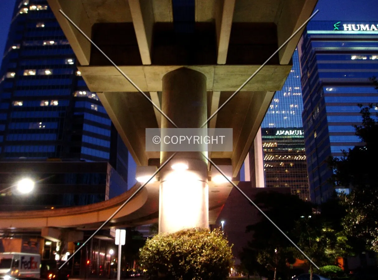 Under the elevated trolley tracks downtown