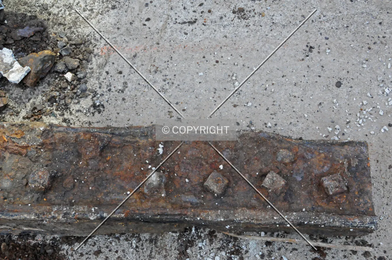 Corroded rail joining plate removed from Erie Street during the installation of new water pipes