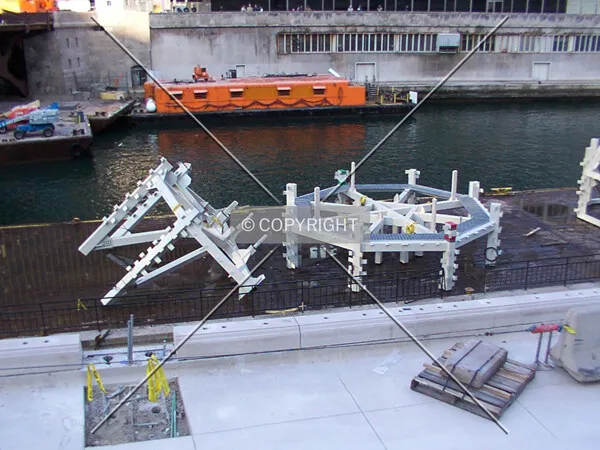 Left half of lower framework (left) and middle ring, on the barge