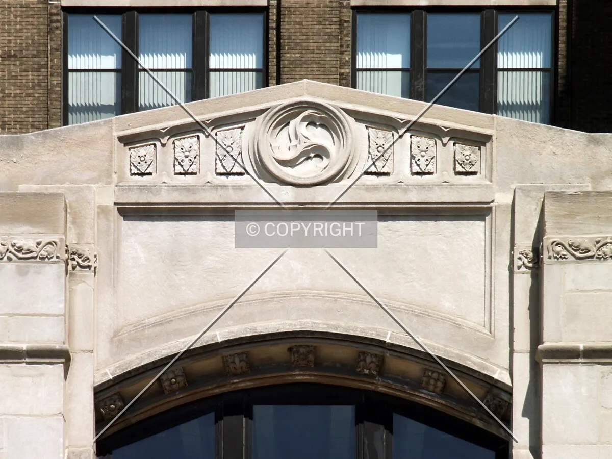 Pediment and archway over the entrance