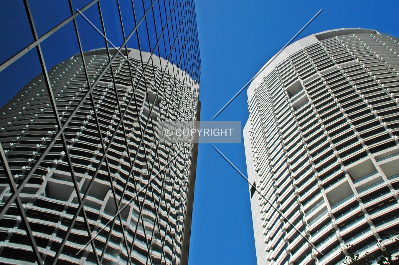 The tower and reflection in a neighbouring building