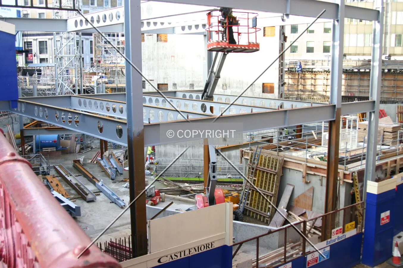 View into the pit from Holborn Viaduct showing rising steelwork