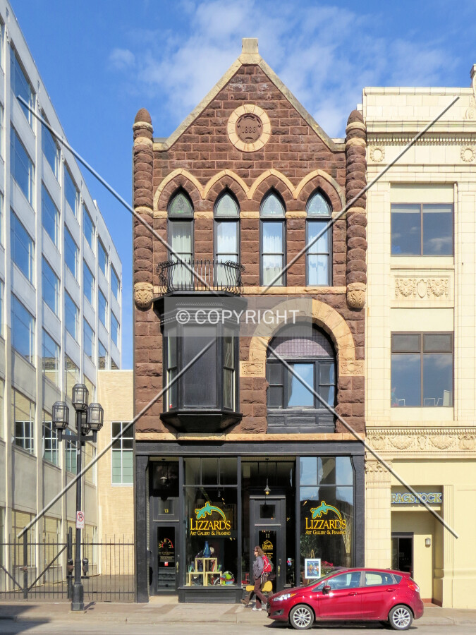Full front elevation from across Superior Street