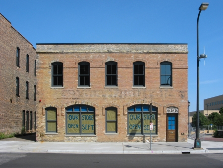 Full front elevation from across 1st Street North